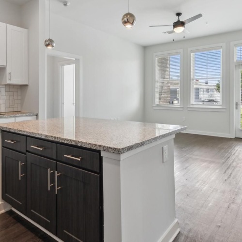 a kitchen with white cabinets