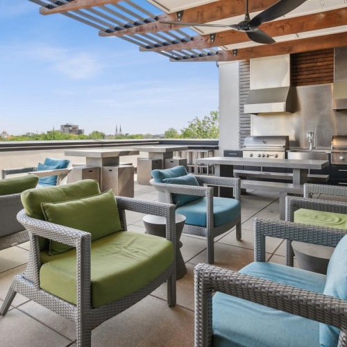 a deck with chairs and a table